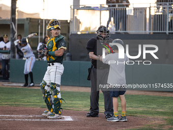 The Oakland Ballers (1) beat the Yolo High Wheelers (0) in game 2 (round 1) of the Pioneer Baseball League's playoffs in Oakland, Calif., on...