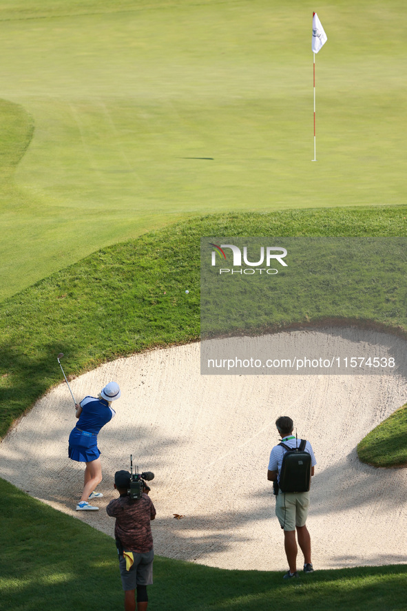 GAINESVILLE, VIRGINIA - SEPTEMBER 14: Madelene Sagstrom of Team Europe hits out of the bunker on the 11th green during Fourball Matches on D...