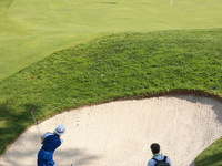 GAINESVILLE, VIRGINIA - SEPTEMBER 14: Madelene Sagstrom of Team Europe hits out of the bunker on the 11th green during Fourball Matches on D...