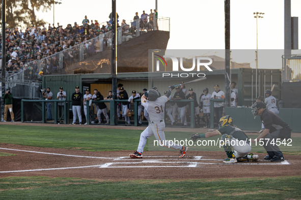 The Oakland Ballers (1) beat the Yolo High Wheelers (0) in game 2 (round 1) of the Pioneer Baseball League's playoffs in Oakland, Calif., on...