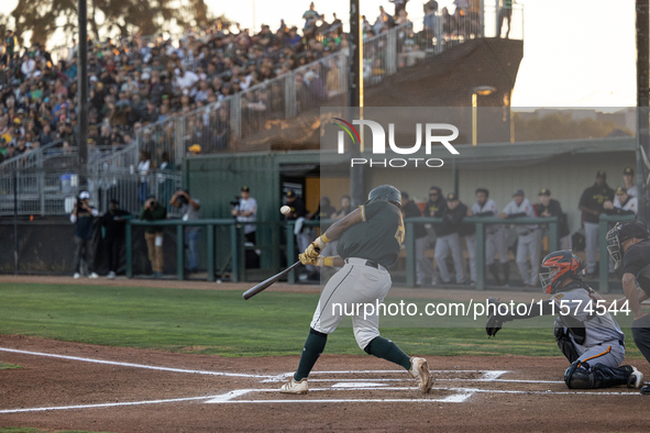 The Oakland Ballers (1) beat the Yolo High Wheelers (0) in game 2 (round 1) of the Pioneer Baseball League's playoffs in Oakland, Calif., on...