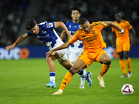 Kylian Mbappe centre-forward of Real Madrid and France and Aramburu of Real Sociedad and Spain compete for the ball during the La Liga match...