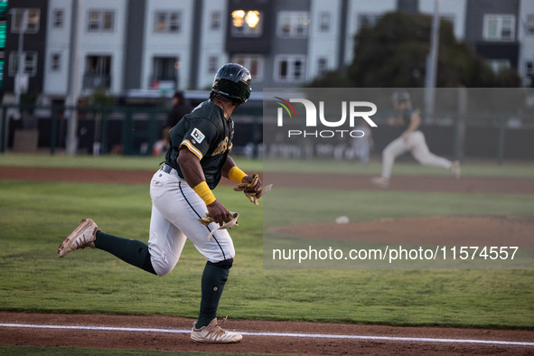 The Oakland Ballers (1) beat the Yolo High Wheelers (0) in game 2 (round 1) of the Pioneer Baseball League's playoffs in Oakland, Calif., on...