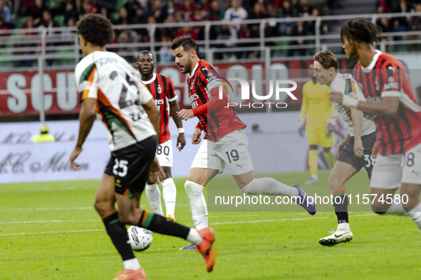 Theo Hernandez is in action during the Serie A match between AC Milan and Venezia FC in Milano, Italy, on September 14, 2024, at Stadio Gius...