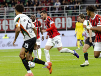 Theo Hernandez is in action during the Serie A match between AC Milan and Venezia FC in Milano, Italy, on September 14, 2024, at Stadio Gius...