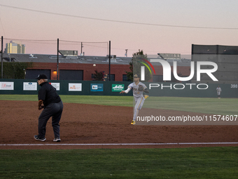 The Oakland Ballers (1) beat the Yolo High Wheelers (0) in game 2 (round 1) of the Pioneer Baseball League's playoffs in Oakland, Calif., on...