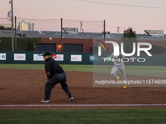 The Oakland Ballers (1) beat the Yolo High Wheelers (0) in game 2 (round 1) of the Pioneer Baseball League's playoffs in Oakland, Calif., on...