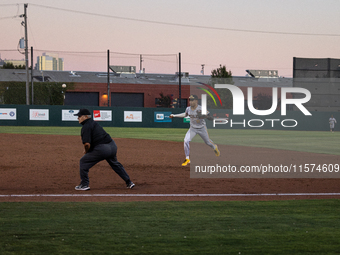 The Oakland Ballers (1) beat the Yolo High Wheelers (0) in game 2 (round 1) of the Pioneer Baseball League's playoffs in Oakland, Calif., on...