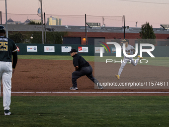 The Oakland Ballers (1) beat the Yolo High Wheelers (0) in game 2 (round 1) of the Pioneer Baseball League's playoffs in Oakland, Calif., on...