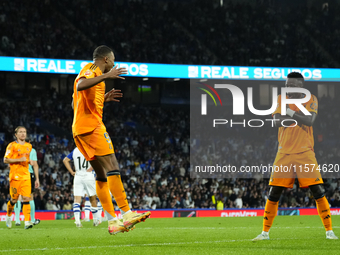 Kylian Mbappe centre-forward of Real Madrid and France celebrates with Vinicius Junior left winger of Real Madrid and Brazil after scoring h...