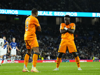 Kylian Mbappe centre-forward of Real Madrid and France celebrates with Vinicius Junior left winger of Real Madrid and Brazil after scoring h...