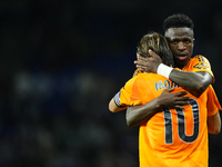 Vinicius Junior left winger of Real Madrid and Brazil celebrates victory after the La Liga match between Real Sociedad de Futbol and Real Ma...