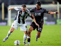 Youssef Maleh of Empoli FC and Teun Koopmeiners of Juventus FC compete for the ball during the Serie A Enilive match between Empoli FC and J...