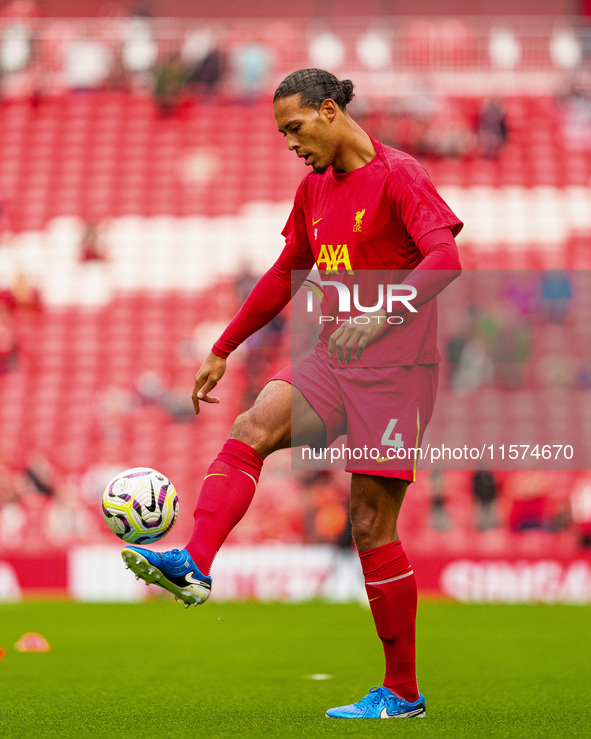 Liverpool's Virgil van Dijk warms up during the Premier League match between Liverpool and Nottingham Forest at Anfield in Liverpool, Englan...