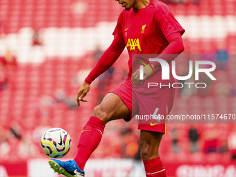 Liverpool's Virgil van Dijk warms up during the Premier League match between Liverpool and Nottingham Forest at Anfield in Liverpool, Englan...