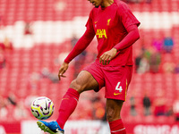 Liverpool's Virgil van Dijk warms up during the Premier League match between Liverpool and Nottingham Forest at Anfield in Liverpool, Englan...