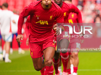 Virgil van Dijk of Liverpool warms up during the Premier League match between Liverpool and Nottingham Forest at Anfield in Liverpool, Engla...