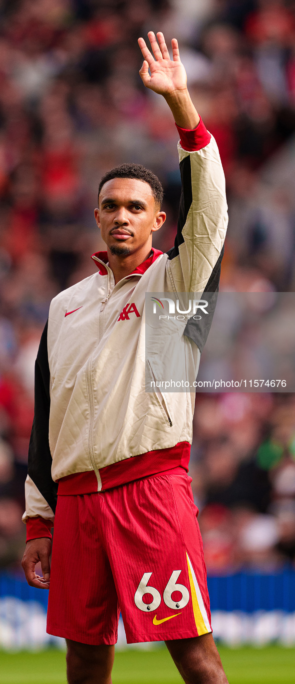 Trent Alexander-Arnold of Liverpool waves to the crowd during the Premier League match between Liverpool and Nottingham Forest at Anfield in...