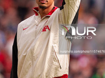 Trent Alexander-Arnold of Liverpool waves to the crowd during the Premier League match between Liverpool and Nottingham Forest at Anfield in...