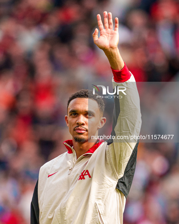 Trent Alexander-Arnold of Liverpool waves to the crowd during the Premier League match between Liverpool and Nottingham Forest at Anfield in...