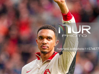 Trent Alexander-Arnold of Liverpool waves to the crowd during the Premier League match between Liverpool and Nottingham Forest at Anfield in...