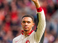 Trent Alexander-Arnold of Liverpool waves to the crowd during the Premier League match between Liverpool and Nottingham Forest at Anfield in...