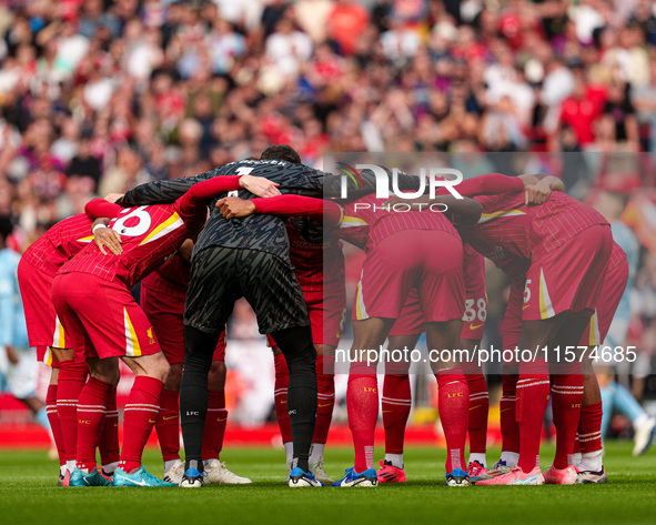 Liverpool's players huddle before the Premier League match between Liverpool and Nottingham Forest at Anfield in Liverpool, England, on Sept...