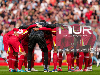 Liverpool's players huddle before the Premier League match between Liverpool and Nottingham Forest at Anfield in Liverpool, England, on Sept...