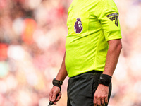 Match referee Michael Oliver during the Premier League match between Liverpool and Nottingham Forest at Anfield in Liverpool, England, on Se...