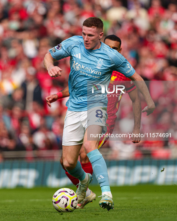 Elliot Anderson of Nottingham Forest is in action during the Premier League match between Liverpool and Nottingham Forest at Anfield in Live...