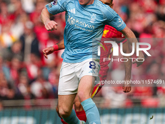 Elliot Anderson of Nottingham Forest is in action during the Premier League match between Liverpool and Nottingham Forest at Anfield in Live...