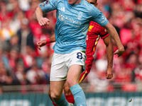 Elliot Anderson of Nottingham Forest is in action during the Premier League match between Liverpool and Nottingham Forest at Anfield in Live...