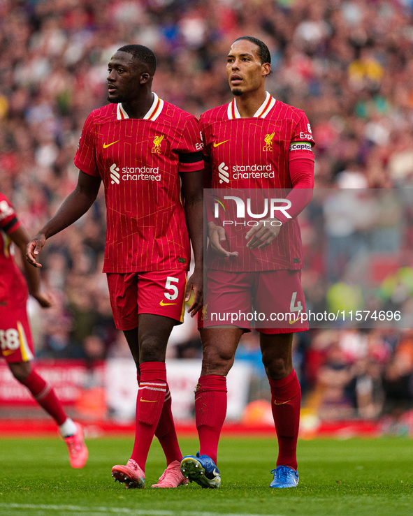 Liverpool's Virgil van Dijk (right) and Ibrahima Konate during the Premier League match between Liverpool and Nottingham Forest at Anfield i...