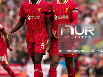 Liverpool's Virgil van Dijk (right) and Ibrahima Konate during the Premier League match between Liverpool and Nottingham Forest at Anfield i...