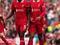 Liverpool's Virgil van Dijk (right) and Ibrahima Konate during the Premier League match between Liverpool and Nottingham Forest at Anfield i...