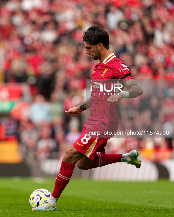 Liverpool's Dominik Szoboszlai is in action during the Premier League match between Liverpool and Nottingham Forest at Anfield in Liverpool,...