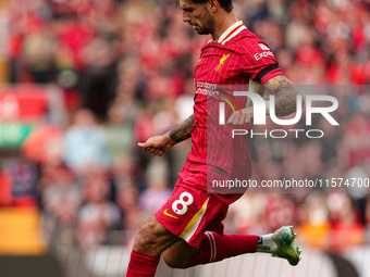 Liverpool's Dominik Szoboszlai is in action during the Premier League match between Liverpool and Nottingham Forest at Anfield in Liverpool,...