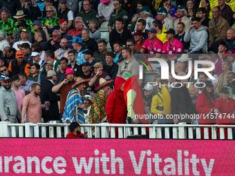 A fancy dress conga takes place in the Hollies stand during the final between Somerset CCC and Gloucestershire CCC at the Vitality Blast Fin...