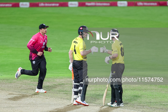 Cameron Bancroft of Gloucestershire receives congratulations for his half-century from Miles Hammond during the final between Somerset CCC a...