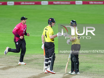 Cameron Bancroft of Gloucestershire receives congratulations for his half-century from Miles Hammond during the final between Somerset CCC a...