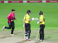 Cameron Bancroft of Gloucestershire receives congratulations for his half-century from Miles Hammond during the final between Somerset CCC a...