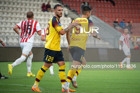 Linus Wahlqvist and Efthymios Koulouris during the game between KS Cracovia and Pogon Szczecin in Krakow, Poland, on September 14, 2024. PKO...