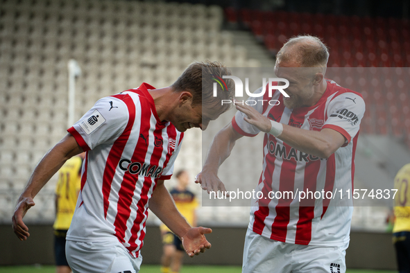 Mikkel Maigaard and Mick van Buren during the game between KS Cracovia and Pogon Szczecin in Krakow, Poland, on September 14, 2024. PKO BP E...