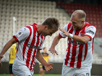 Mikkel Maigaard and Mick van Buren during the game between KS Cracovia and Pogon Szczecin in Krakow, Poland, on September 14, 2024. PKO BP E...