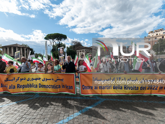 The Association of Iranian Graduates resident in Italy demonstrates on the anniversary of the killing of Mahsa Amini in Iran in Rome, Italy,...