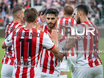 Cracovia players celebrate scoring a goal during the game between KS Cracovia and Pogon Szczecin in Krakow, Poland, on September 14, 2024. P...