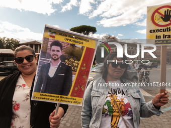 The Association of Iranian Graduates resident in Italy demonstrates on the anniversary of the killing of Mahsa Amini in Iran in Rome, Italy,...