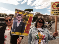 The Association of Iranian Graduates resident in Italy demonstrates on the anniversary of the killing of Mahsa Amini in Iran in Rome, Italy,...