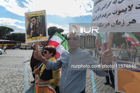 The Association of Iranian Graduates resident in Italy demonstrates on the anniversary of the killing of Mahsa Amini in Iran in Rome, Italy,...