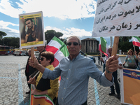 The Association of Iranian Graduates resident in Italy demonstrates on the anniversary of the killing of Mahsa Amini in Iran in Rome, Italy,...